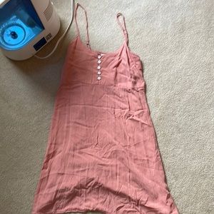 This is a sundress from Arizona Jean Co. It’s a size small and pink.